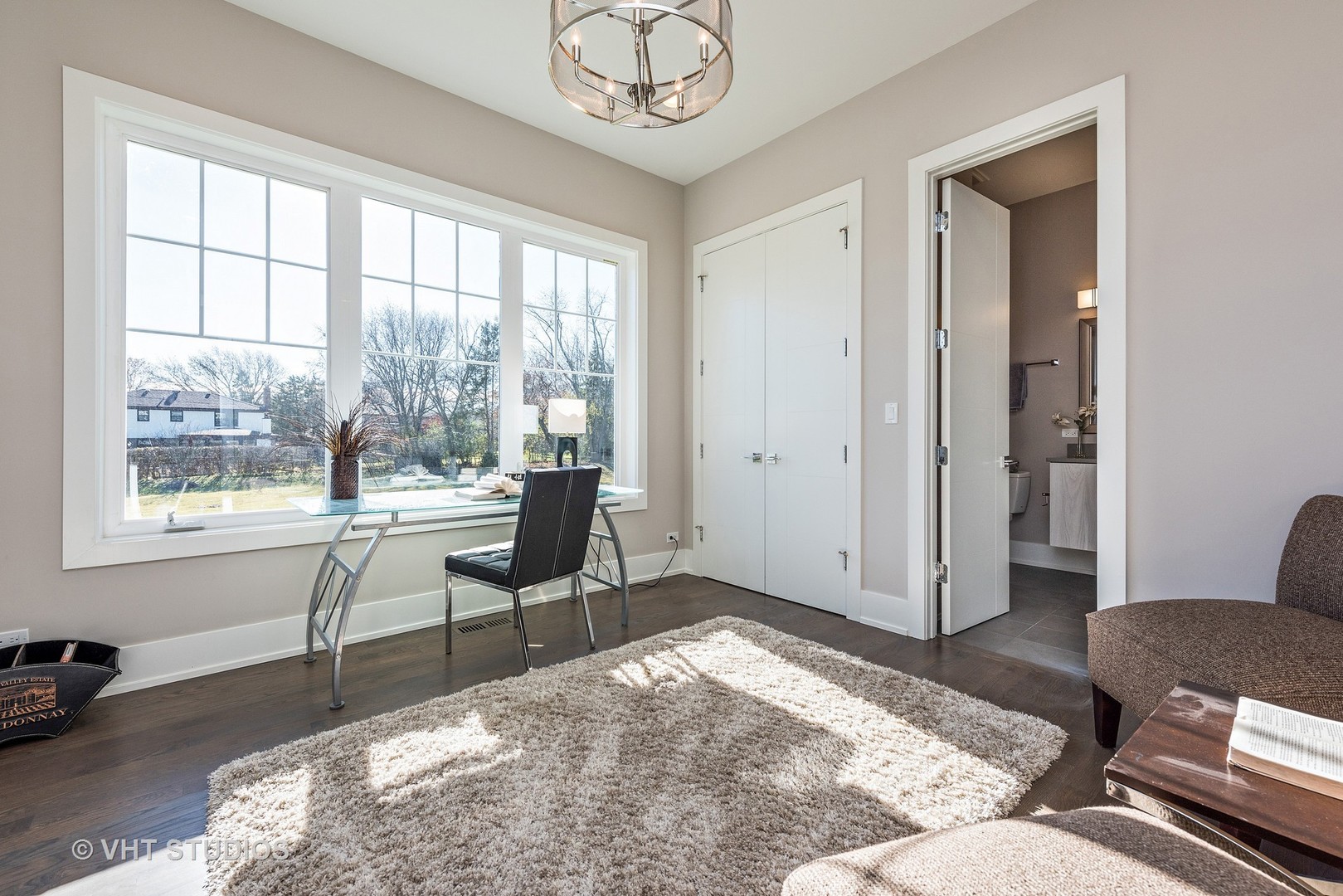 2709 Walters Avenue Northbrook, IL 60062 - Photo 22 of 33 a living room with furniture and a window