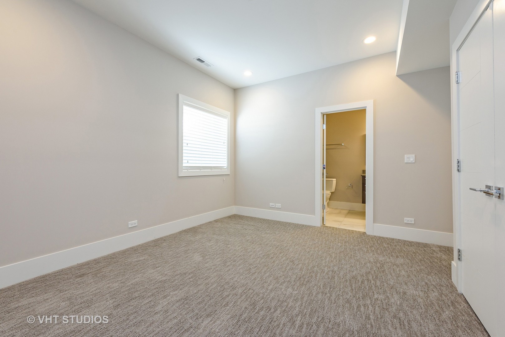 2709 Walters Avenue Northbrook, IL 60062 - Photo 30 of 33 an empty room with windows and closet
