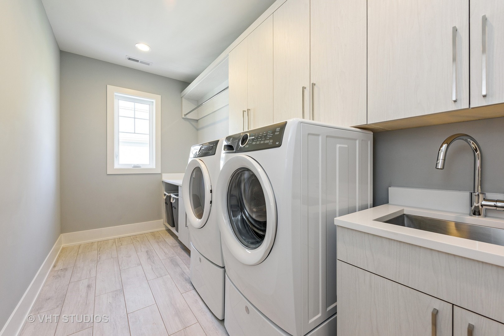 2709 Walters Avenue Northbrook, IL 60062 - Photo 31 of 33 a utility room with sink dryer and washer