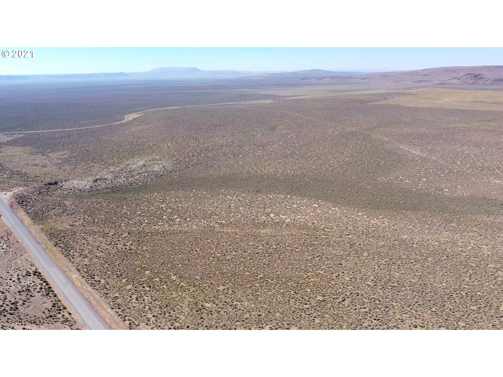 1 Cv-wagontire Road Riley, OR 97758 - Photo 2 of 20 a black and white photo of a room