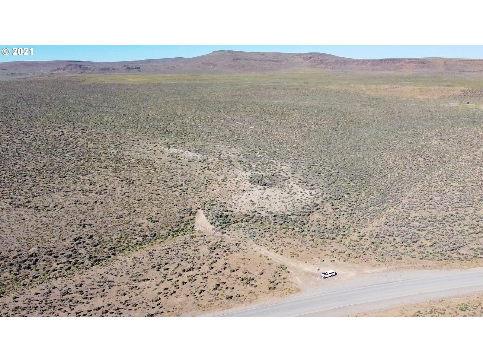 1 Cv-wagontire Road Riley, OR 97758 - Photo 15 of 20 a black and white photo of a field