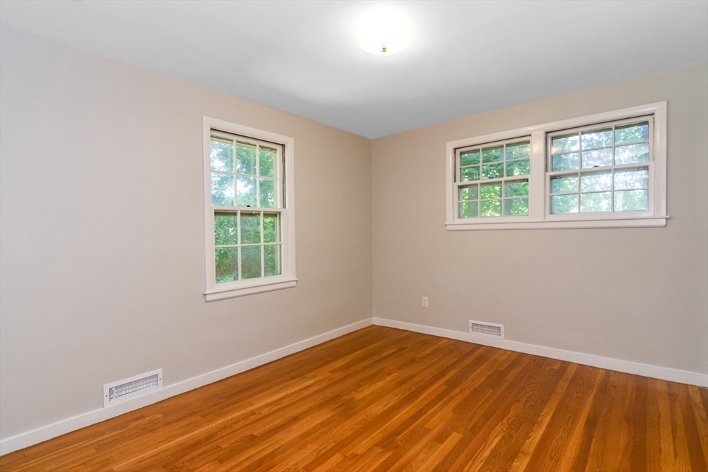 39 Beechmont Street Worcester, MA 01609 - Photo 16 of 42 an empty room with a window