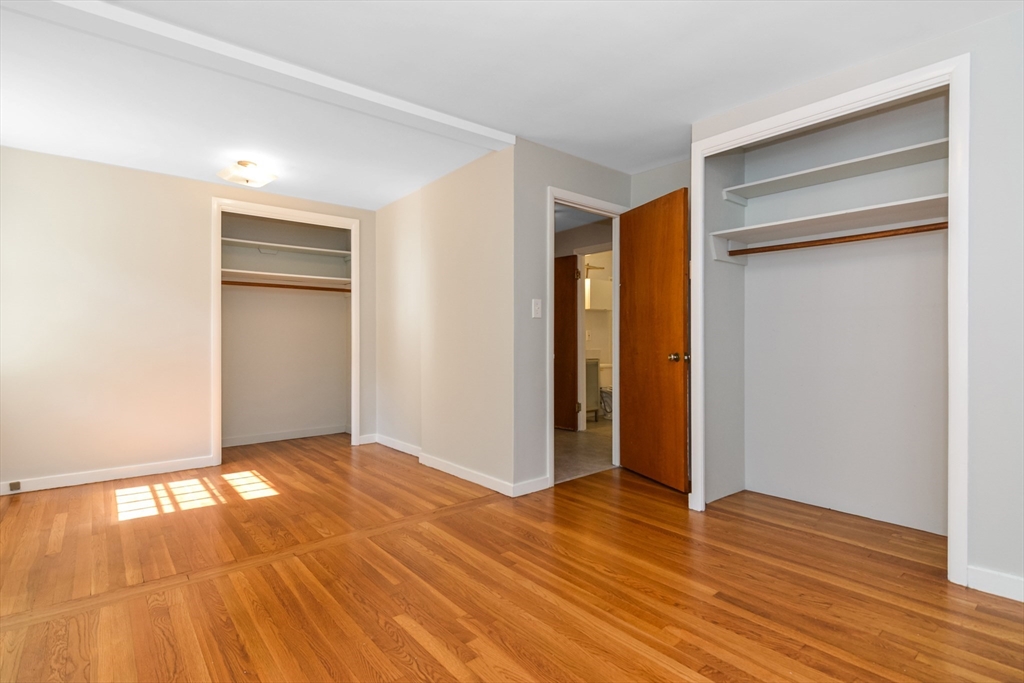 39 Beechmont Street Worcester, MA 01609 - Photo 20 of 42 a view of an empty room with wooden floor