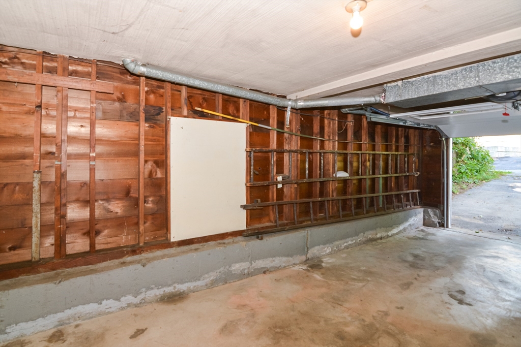 39 Beechmont Street Worcester, MA 01609 - Photo 42 of 42 a view of an empty room with a garage
