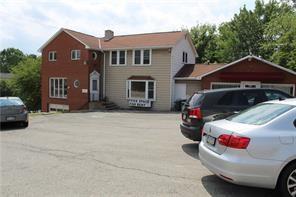995 A Brodhead Road Coraopolis, PA 15108 - Photo 2 of 10 a front view of a house with a yard