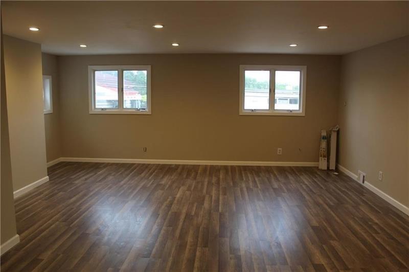 995 A Brodhead Road Coraopolis, PA 15108 - Photo 10 of 10 an empty room with wooden floor and windows