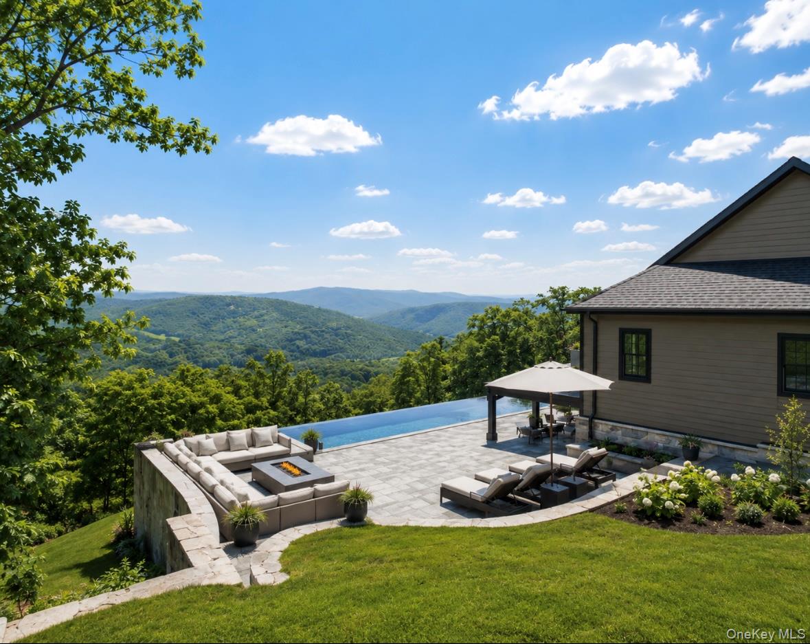 55 Ridgecrest Road Putnam Valley, NY 10537 - Photo 2 of 33 a view of a patio with furniture