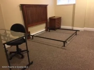 a room with a table and chairs