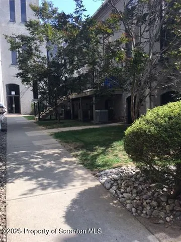 a house view with a outdoor space