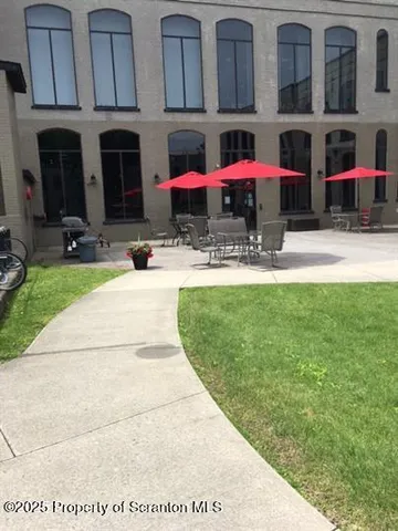 a view of a hallway with staircase