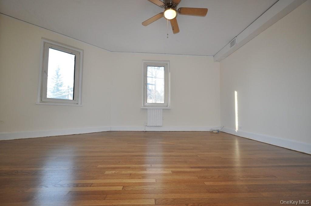 69 Harney Road, Unit 3A Scarsdale, NY 10583 - Photo 18 of 22 Large bedroom with refinished hardwood floors.
