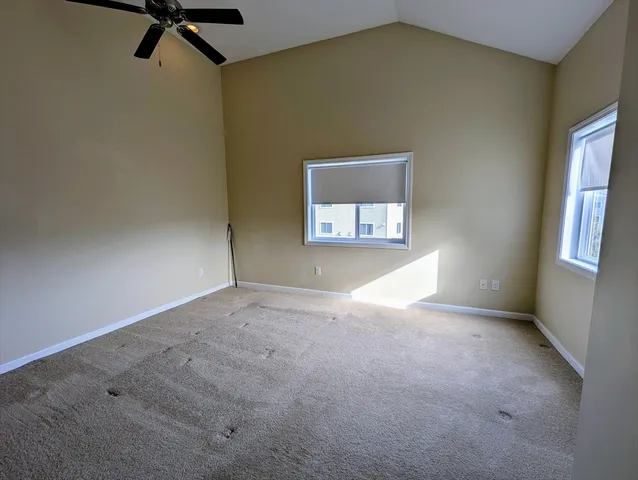 a view of empty room with windows
