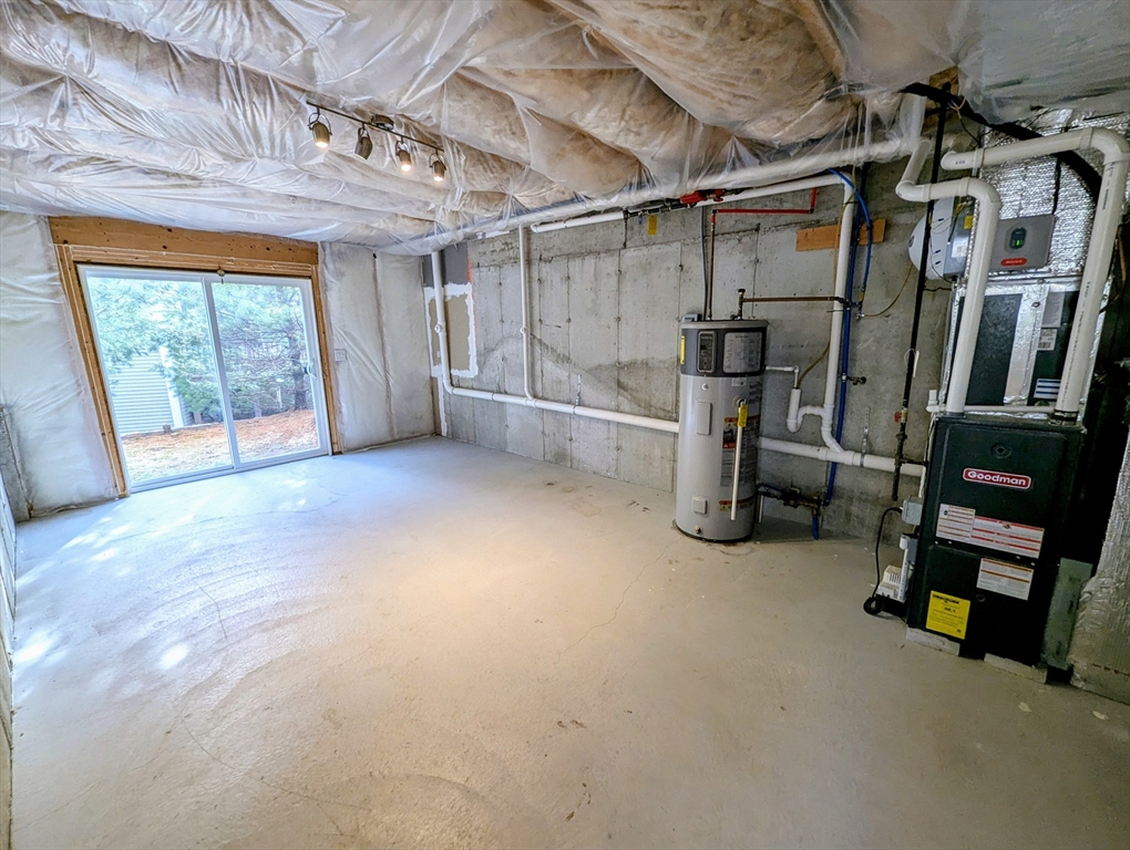 391 America Boulevard, Unit 391 Ashland, MA 01721 - Photo 19 of 22 a view of a room with gym equipment