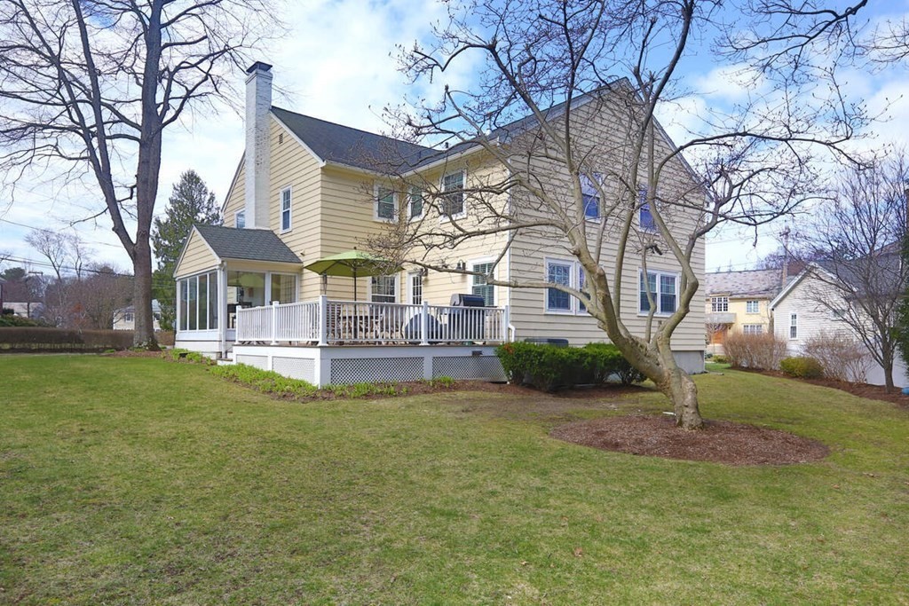 79 Evelyn Road Waban, MA 02468 - Photo 15 of 16 a view of a house with a yard