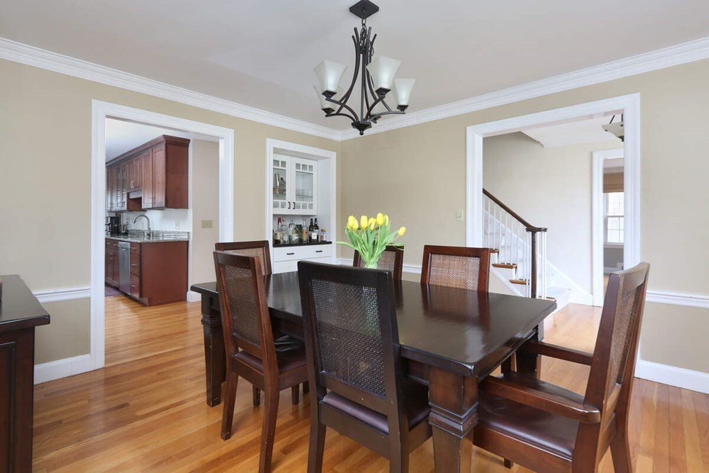 79 Evelyn Road Waban, MA 02468 - Photo 7 of 16 a view of a dining room with furniture window and wooden floor