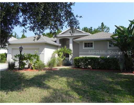 12105 Whistling Way Lakewood Ranch, FL 34202 - Photo 1 of 1 a view of a house with a yard