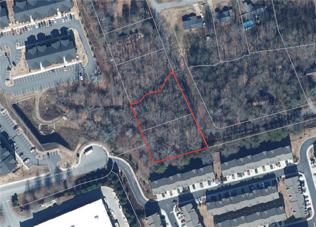 163 Tabor Street Central, SC 29630 - Photo 7 of 7 This aerial view showcases a vacant lot, ready for development, nestled within an established community.