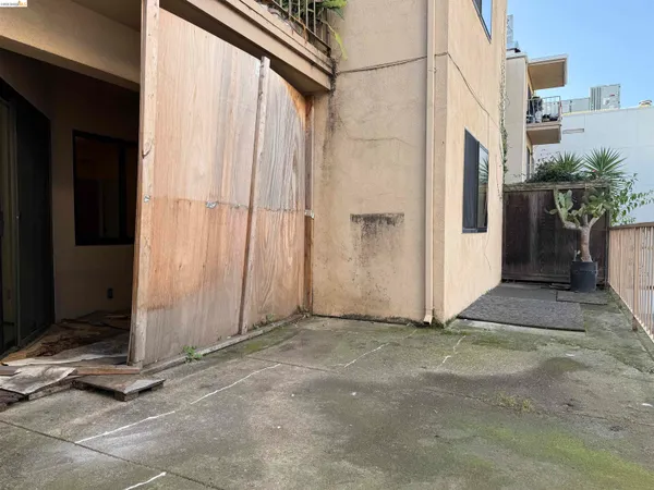 a view of a front door and wooden door