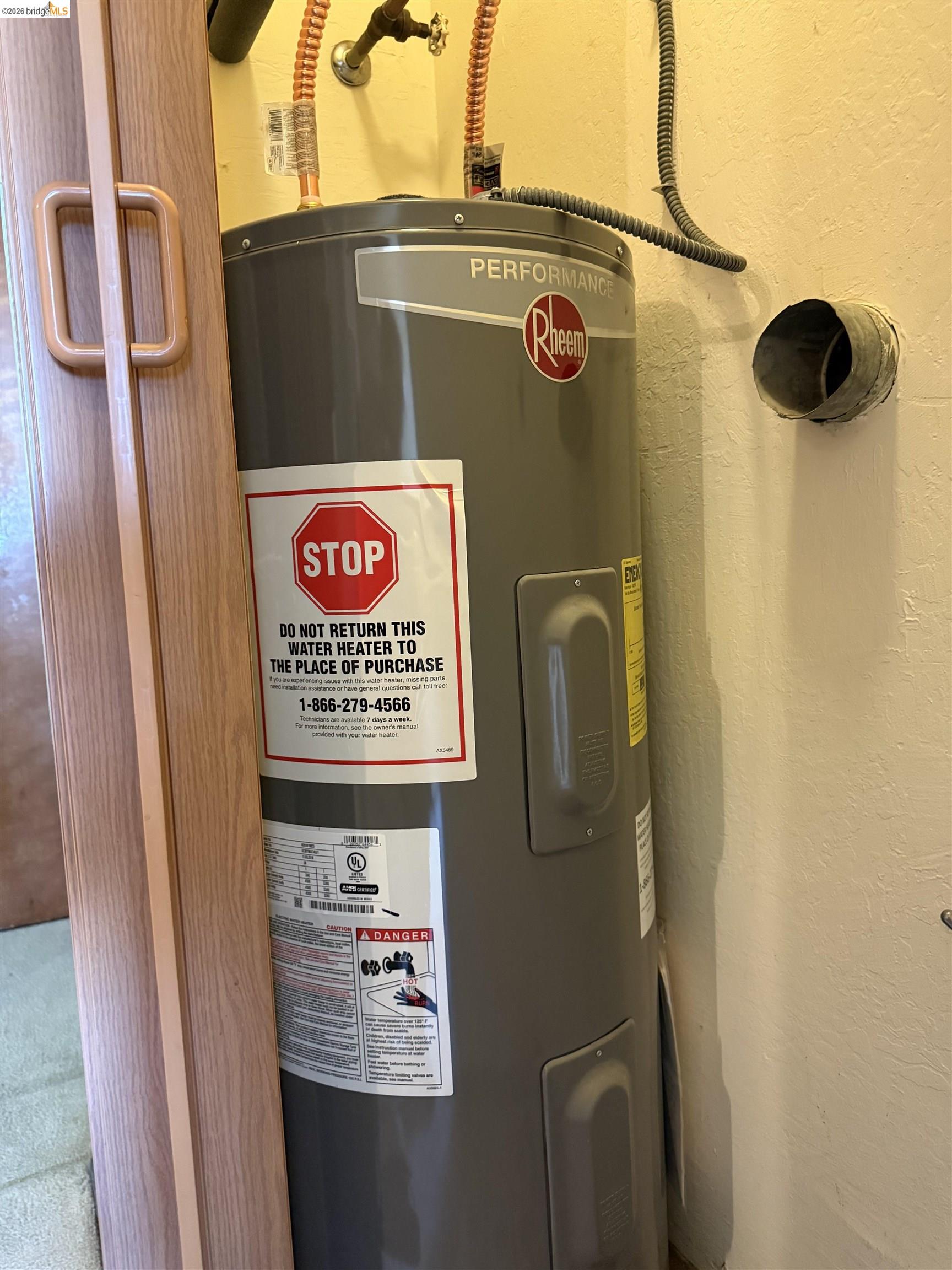 330 8th Street, Unit 3D Oakland, CA 94607 - Photo 10 of 13 Utility room with electric water heater
