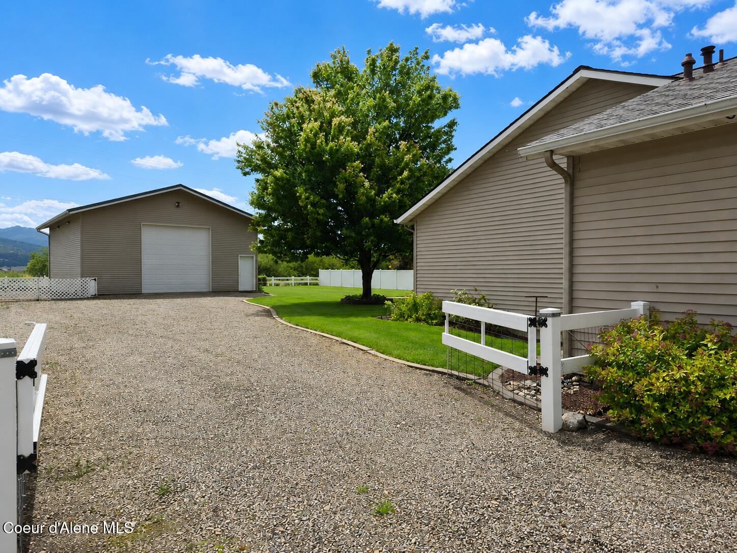 2104 West Evening Star Road Post Falls, ID 83854 - Photo 3 of 22 Side Yard and Shop