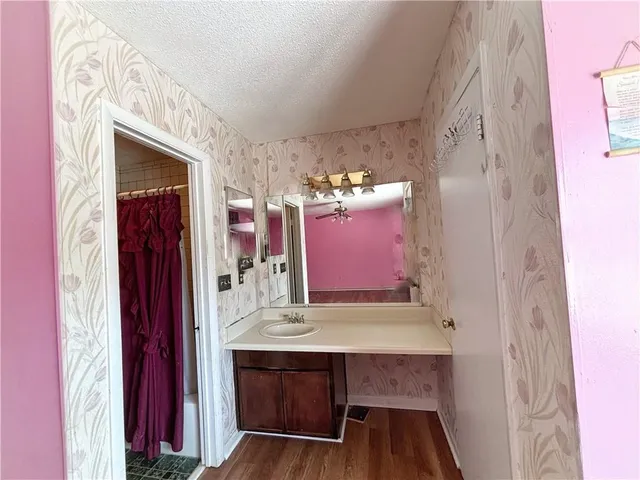 a view of dinning room with furniture and wooden floor