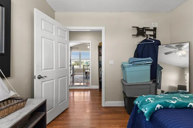 a bedroom with bed and a fireplace