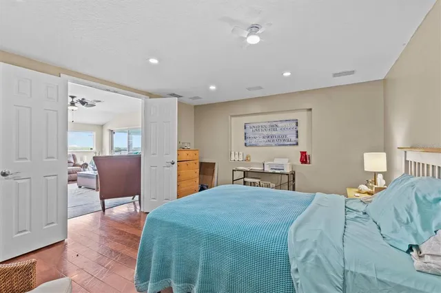 a view of a house with sitting area and wooden floor