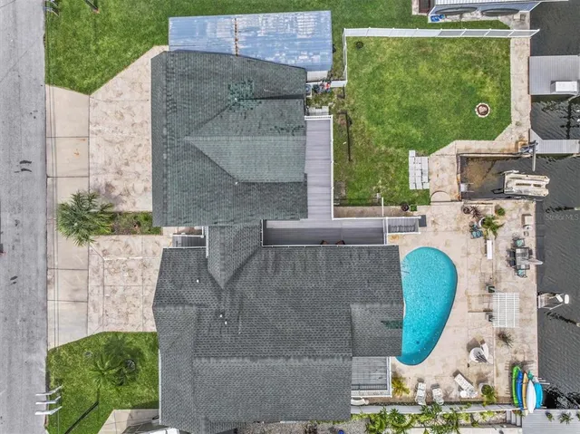 a open kitchen with stainless steel appliances granite countertop a stove and cabinets