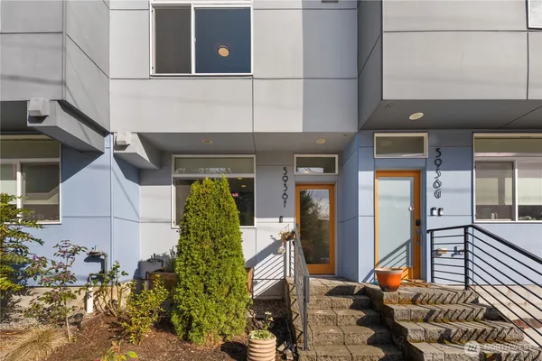 a building with glass door and outdoor space