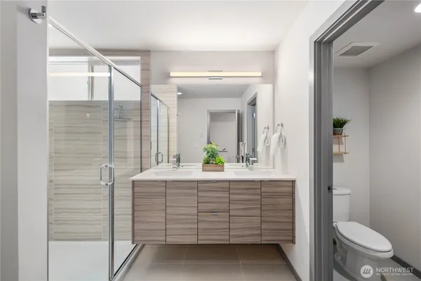 a bathroom with a sink and mirror