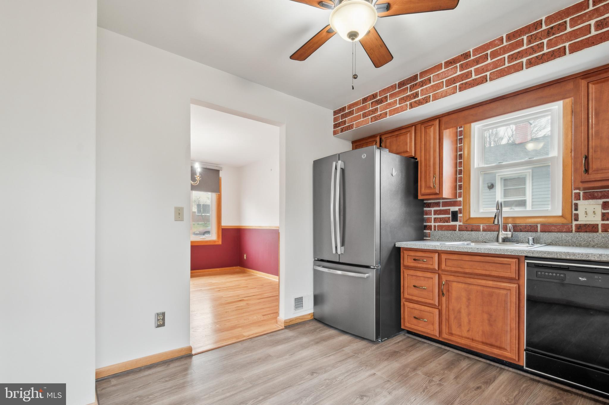 3308 Upton Road Baltimore, MD 21234 - Photo 12 of 44 a kitchen with stainless steel appliances granite countertop a refrigerator and a sink