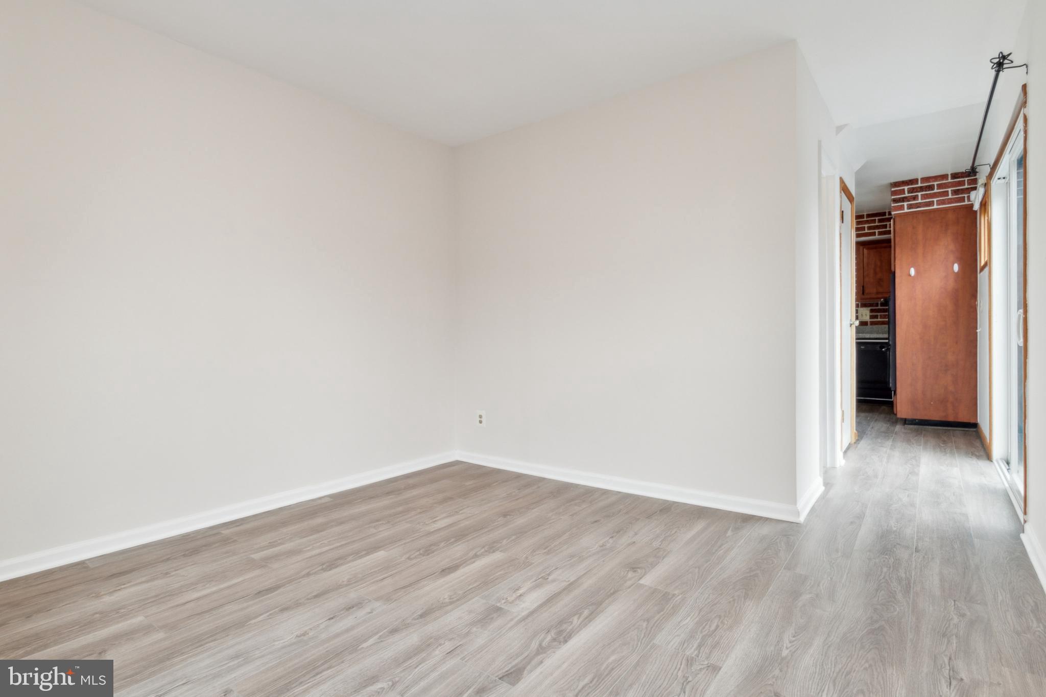 3308 Upton Road Baltimore, MD 21234 - Photo 16 of 44 a view of a small space with wooden floor and a small space