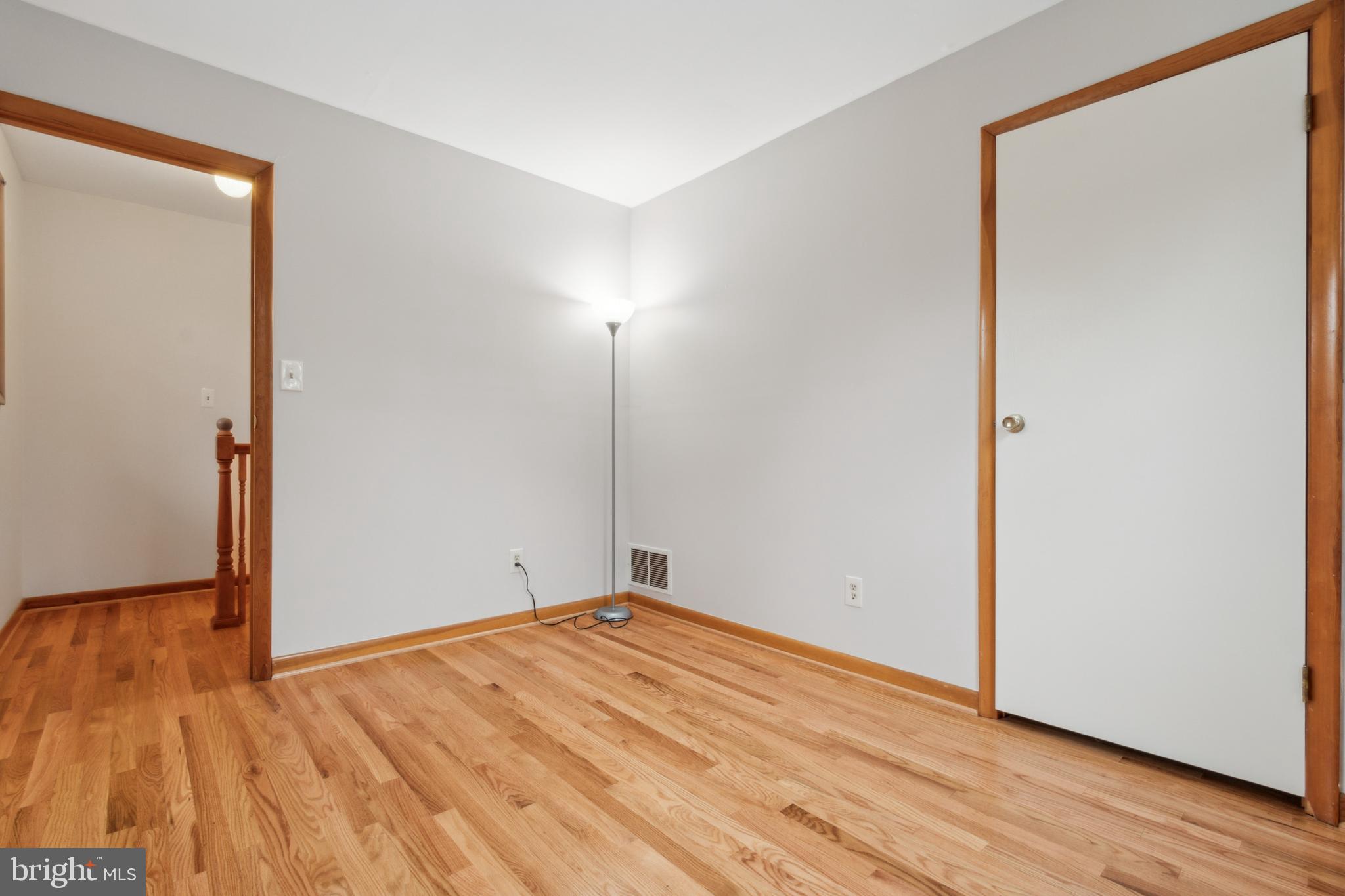 3308 Upton Road Baltimore, MD 21234 - Photo 20 of 44 a view of empty room with wooden floor