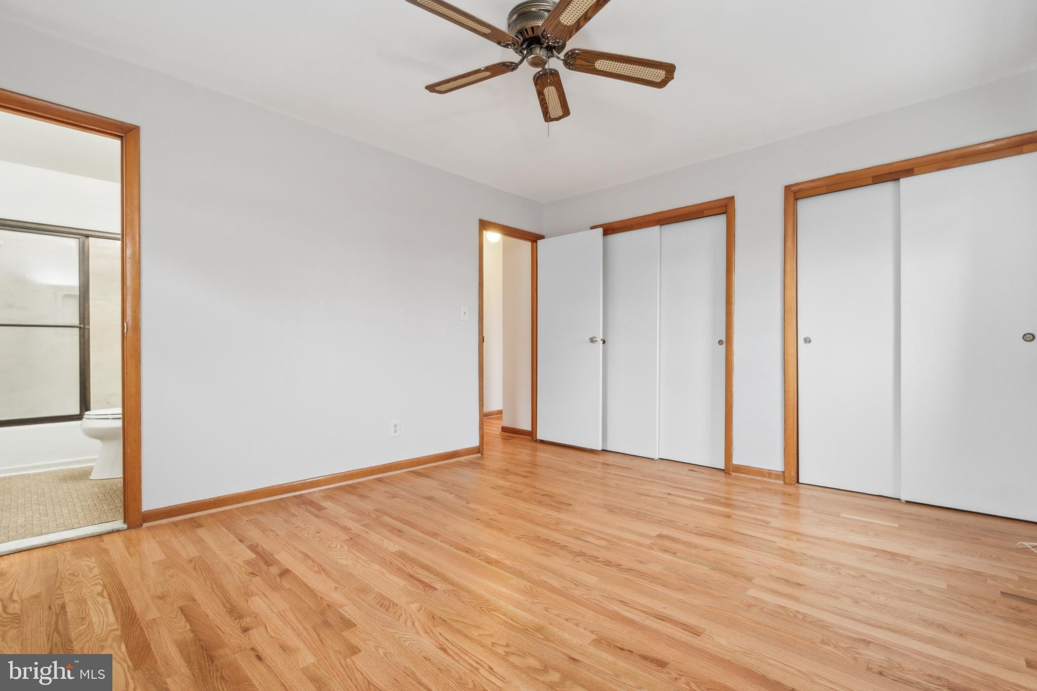 3308 Upton Road Baltimore, MD 21234 - Photo 24 of 44 a view of an empty room with wooden floor and a window