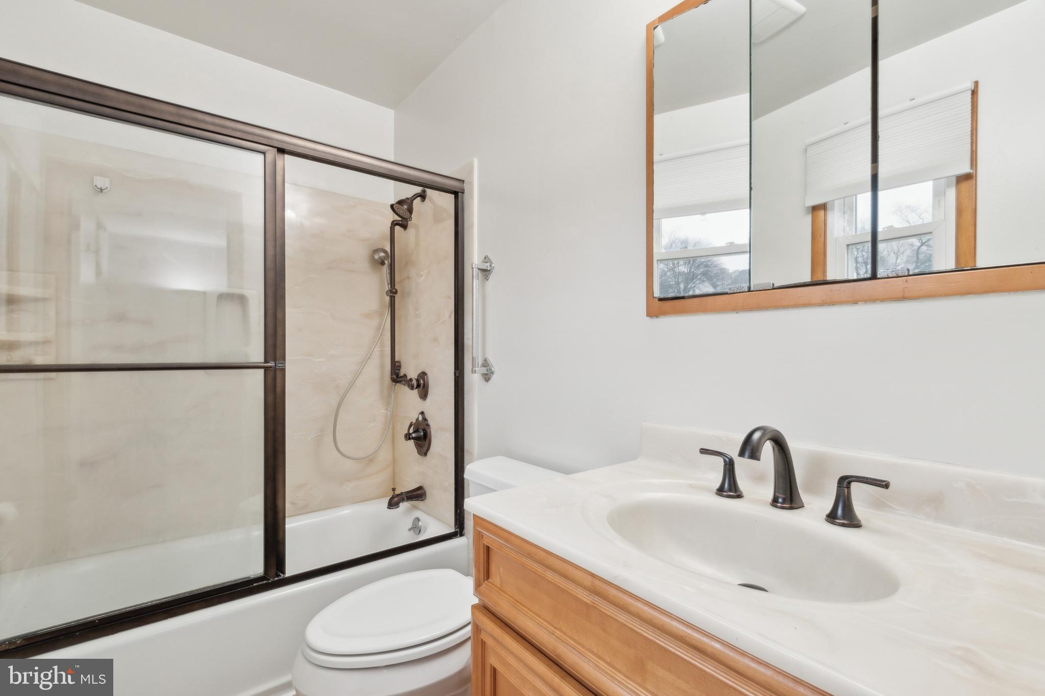 3308 Upton Road Baltimore, MD 21234 - Photo 25 of 44 a bathroom with a sink toilet and shower