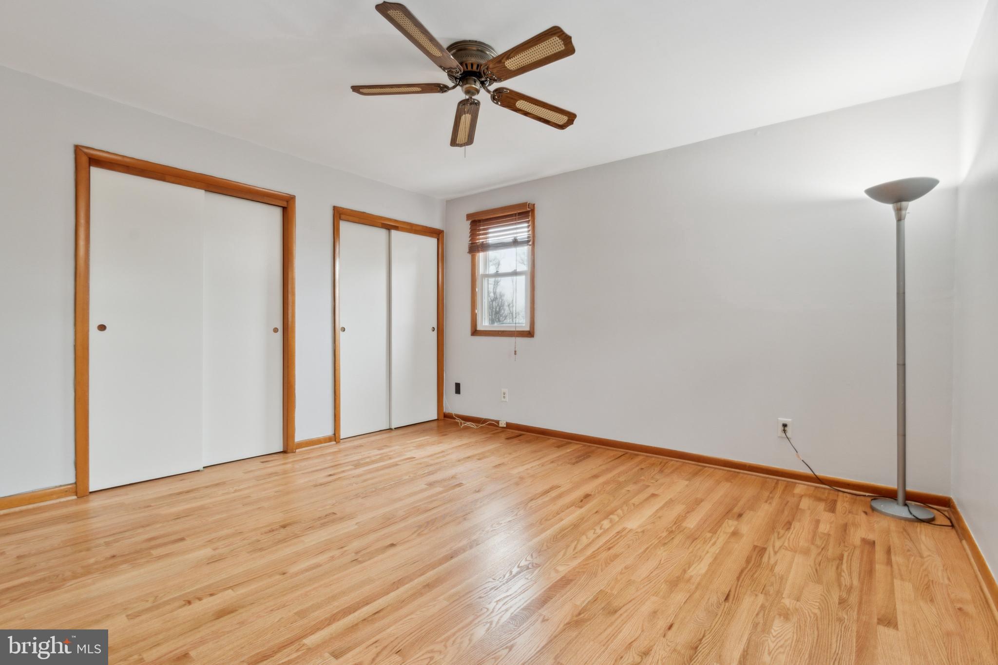 3308 Upton Road Baltimore, MD 21234 - Photo 27 of 44 wooden floor in an empty room with a window