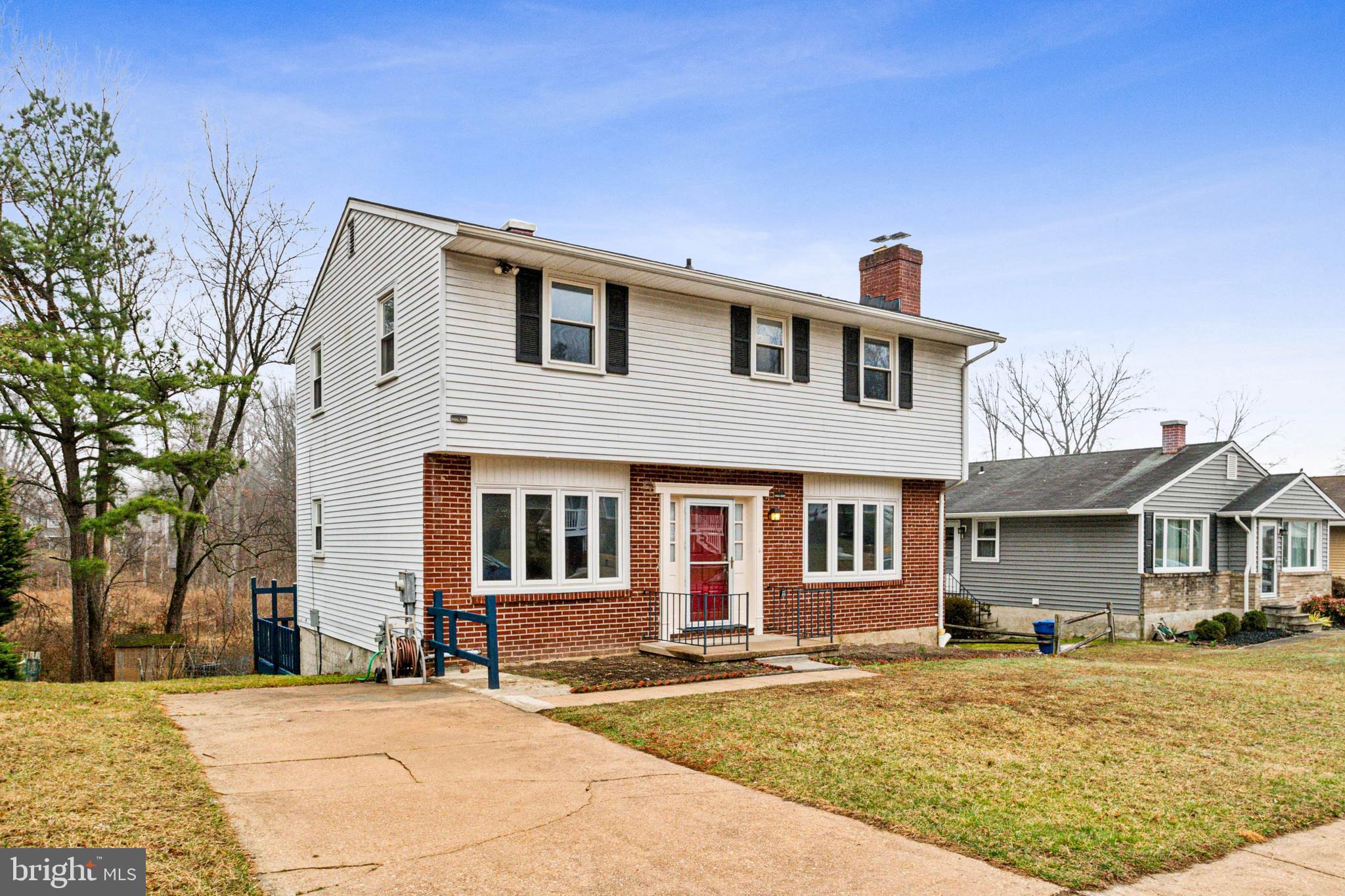 3308 Upton Road Baltimore, MD 21234 - Photo 3 of 44 a front view of a house with a yard