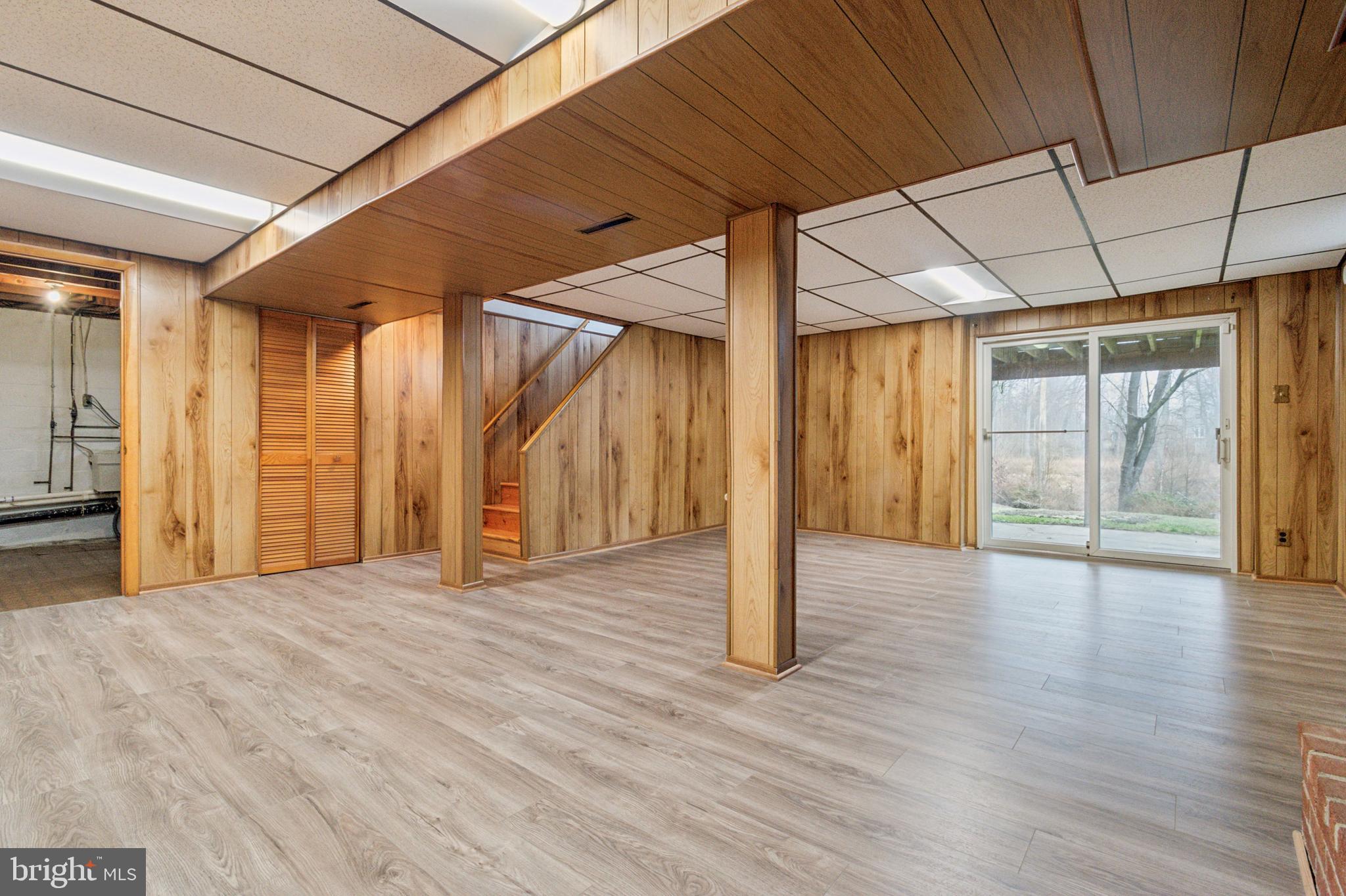 3308 Upton Road Baltimore, MD 21234 - Photo 32 of 44 a view of an empty room with wooden floor