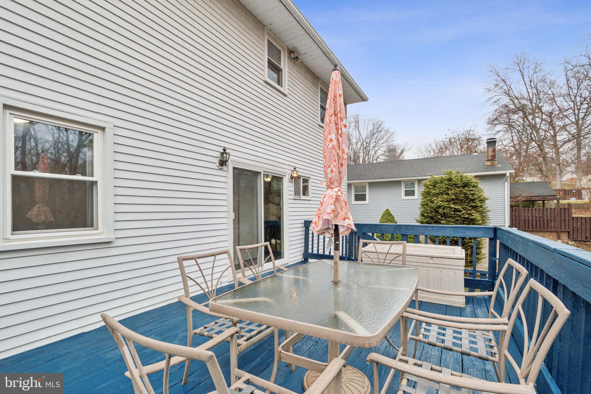 3308 Upton Road Baltimore, MD 21234 - Photo 36 of 44 a view of house with a chairs and table in a patio