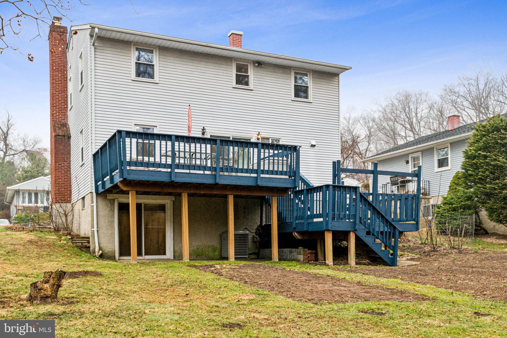3308 Upton Road Baltimore, MD 21234 - Photo 39 of 44 a view of a house with large windows and a wooden floor