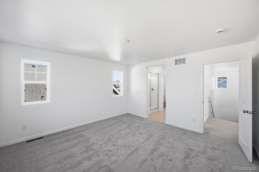 39803 Penn Road Elizabeth, CO 80107 - Photo 17 of 43 a view of an empty room with a window