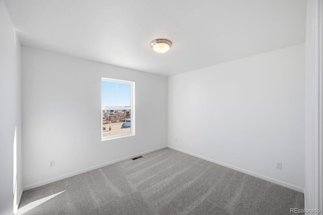 39803 Penn Road Elizabeth, CO 80107 - Photo 22 of 43 an empty room with a window