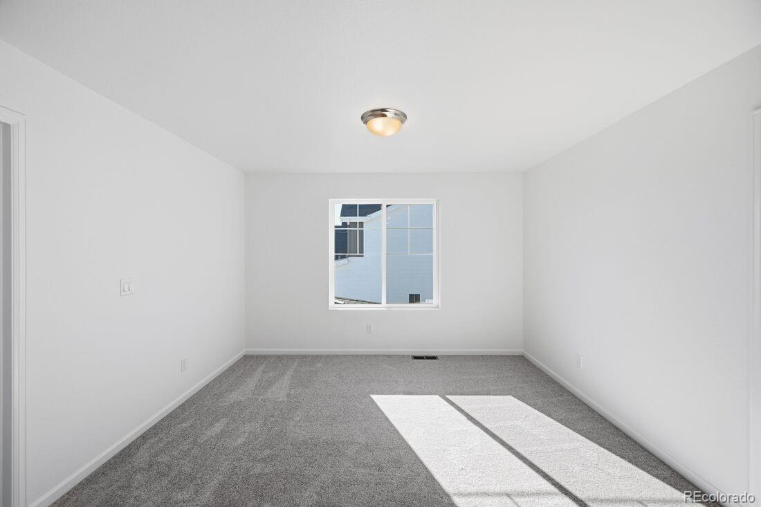 39803 Penn Road Elizabeth, CO 80107 - Photo 27 of 43 an empty room with a window