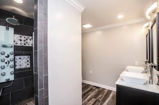 a bathroom with a sink and a mirror