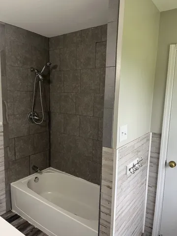 a bathroom with a bathtub