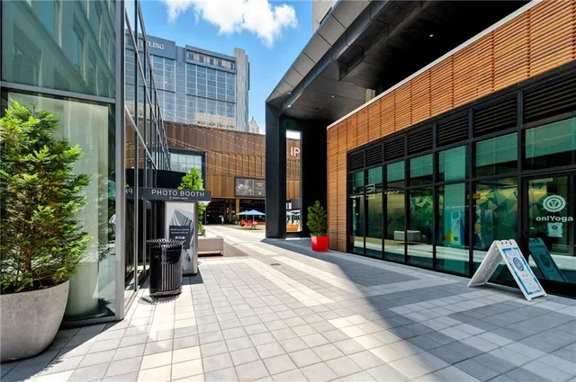 a view of a building with sitting area