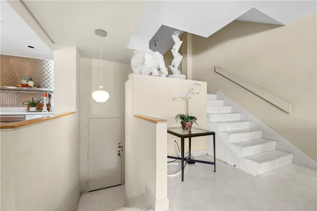 a view of entryway and workspace