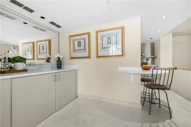 a kitchen with stainless steel appliances a sink and a refrigerator