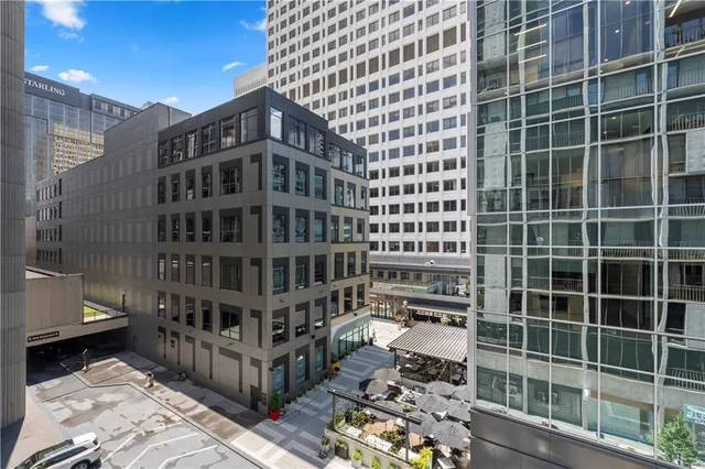 a view of a balcony with chairs
