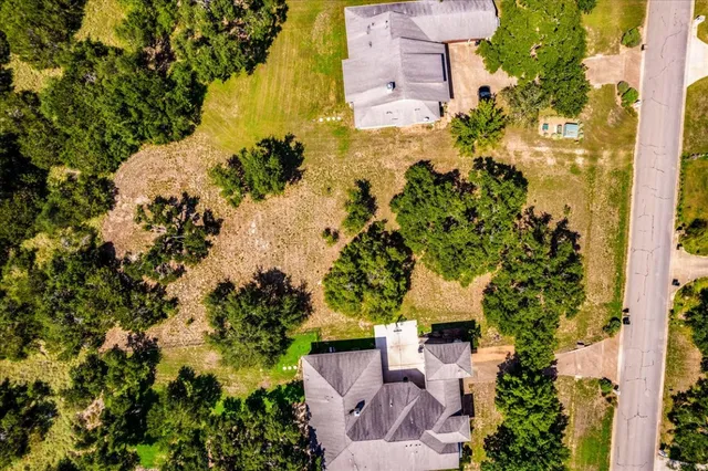 a view of a yard with an outdoor space